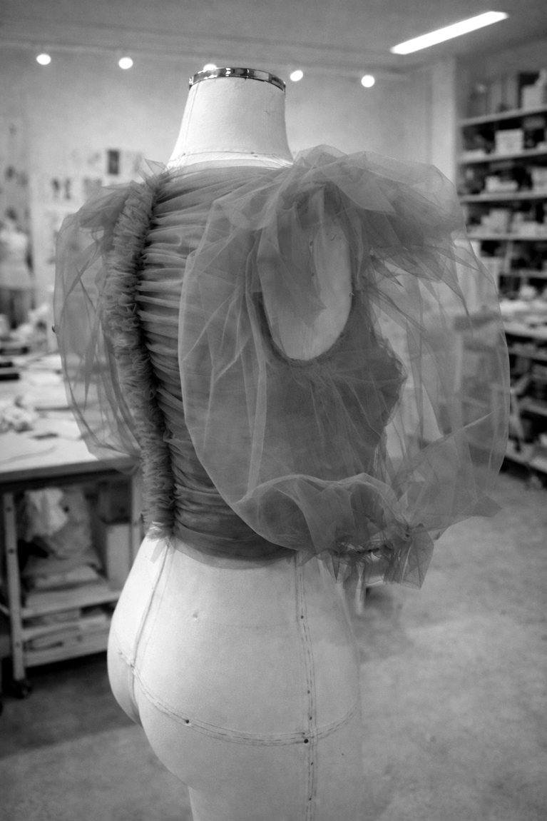 A tulle-sleeve top, on the form