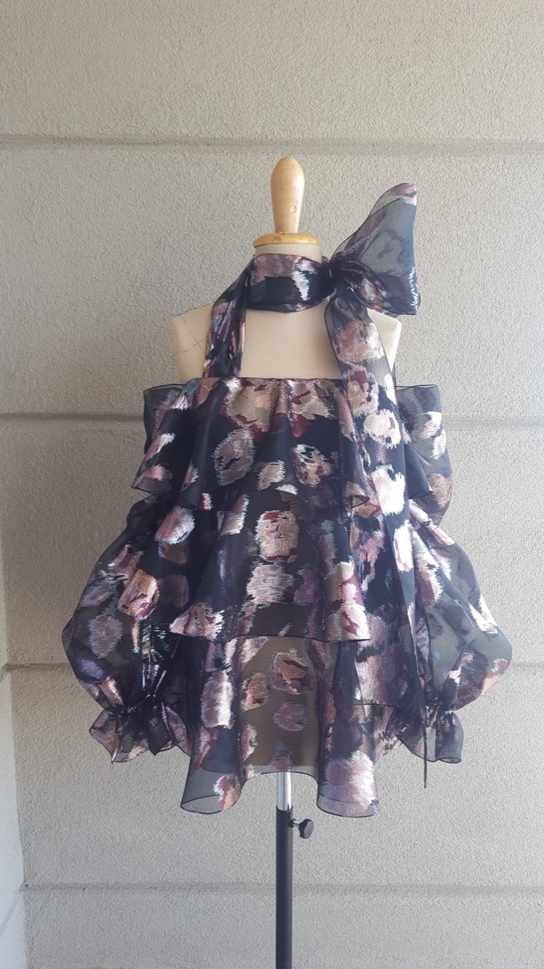 Finished dress, front view with neck bow